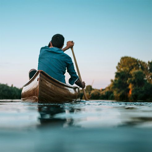 A person canoeing