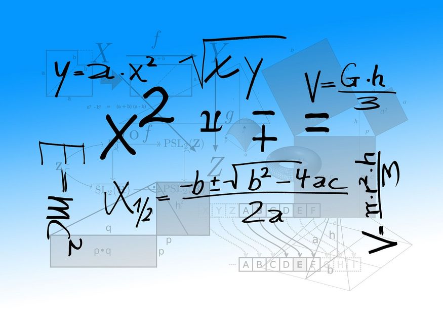 Auf einem blauen Blatt stehen in schwarzer Schrift mathematische Formeln.