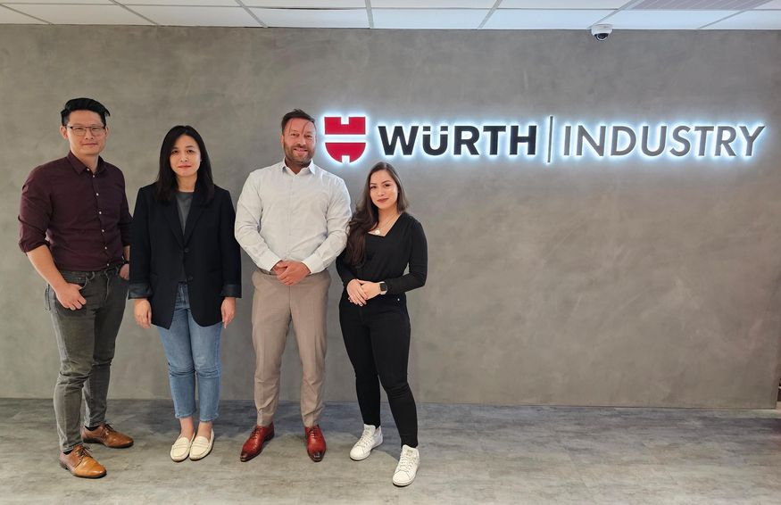 Here is a photo with Bjoern Burg, Managing Director; Iris Tsai, SCM Manager; and Russell Cheng, Sales Director; and Cinthya Rodriguez in front of the Würth Industry sign.