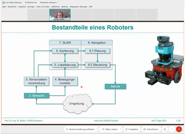 Blick auf einen Bildschirm während einer Online-Konferenz. Auf der Präsentationsfolie ist ein Roboter zu sehen, darüber der Referent Prof. Dr. Michael Blaich.